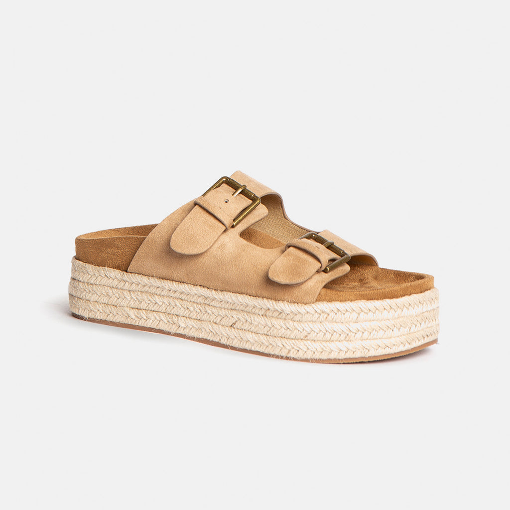 Sandalias color camel
Sandalias de doble hebilla dorada
Calzado boho-chic
Sandalias con plataforma de yute
Moda en sandalias 2025
Sandalias elegantes y cómodas
Sandalias versátiles para cualquier look
Calzado ligero y trendy
Sandalias para playa y ciudad
Sandalias con estilo bohemio y moderno
Sandalias con detalles dorados
Sandalias de moda para mujer
Calzado casual 
Sandalias ideales para verano
Sandalias
Comodidad y estilo en un solo diseño
Sandalias perfectas para combinar con vestidos y jeans
Tendencias